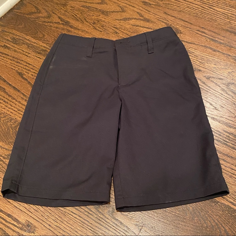 Under Armour boys black shorts, size 12.